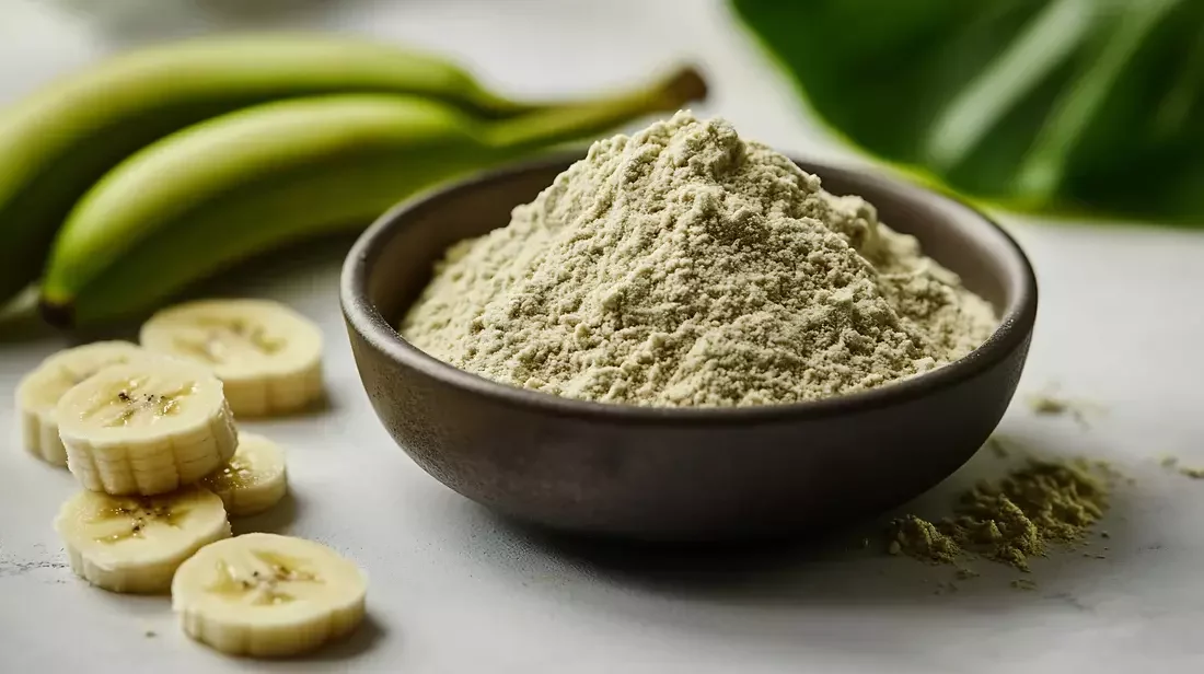 Organic raw banana powder in a glass jar, made from sun-dried green bananas, ideal for babies and natural health remedies