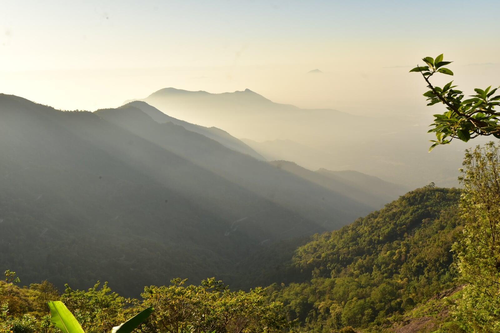 Majestic mountain landscape under a clear sky, seen from the Shanti Earth retreat